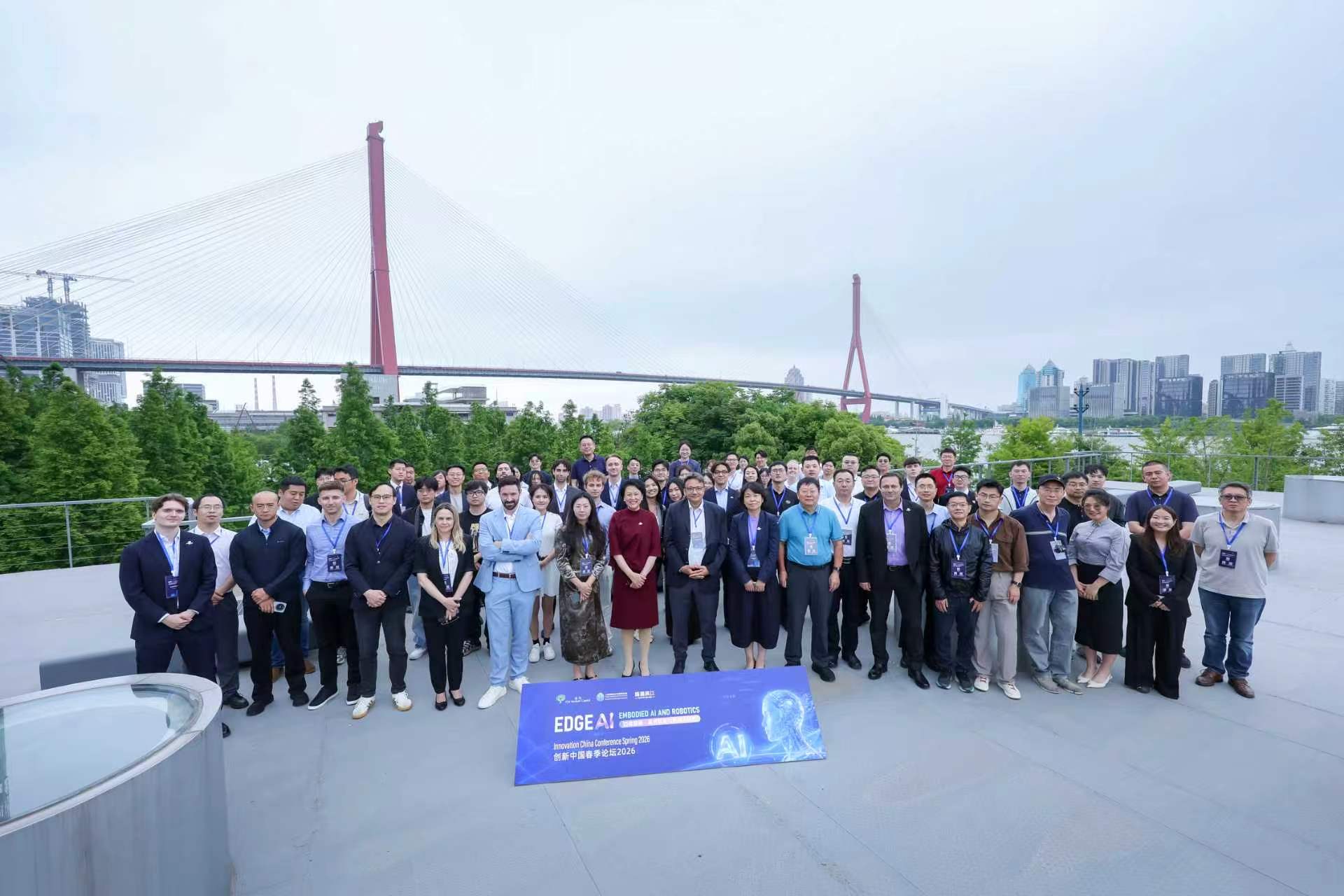 Conference participants gathered on a Shanghai rooftop