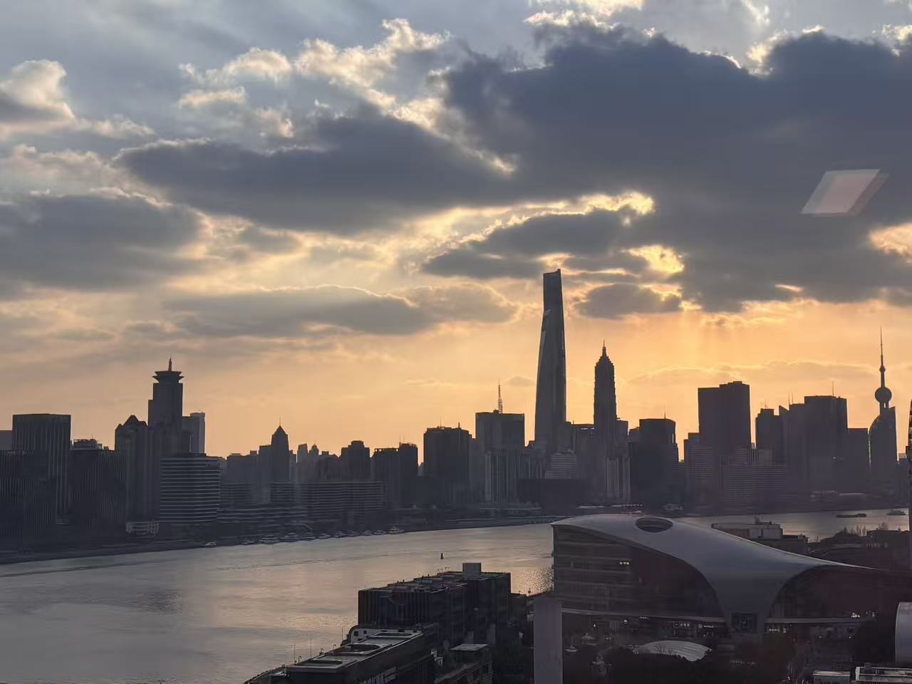 Sunset over the Huangpu River and Shanghai skyline from the CM office